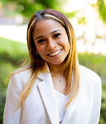 female in white suit