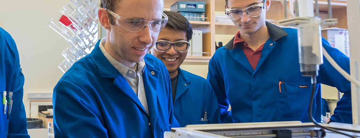 Professor Jessica Wang's researchers watch the printing of their newly synthesized materials.