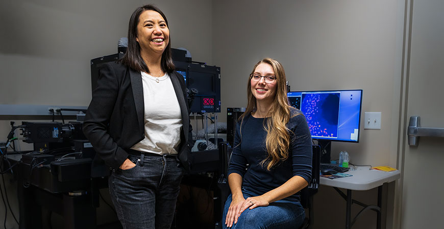 Professor Stephanie Woo, left, and graduate student Leesa Strasser are trying to unlock the mechanics of endodermal cells.